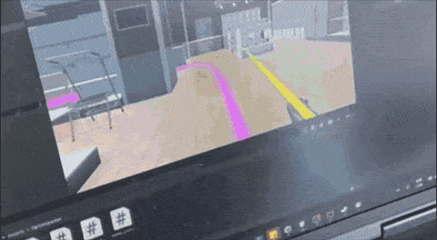 Animated GIF showing a head-motion-controlled wheelchair navigating a Unity virtual-reality supermarket environment